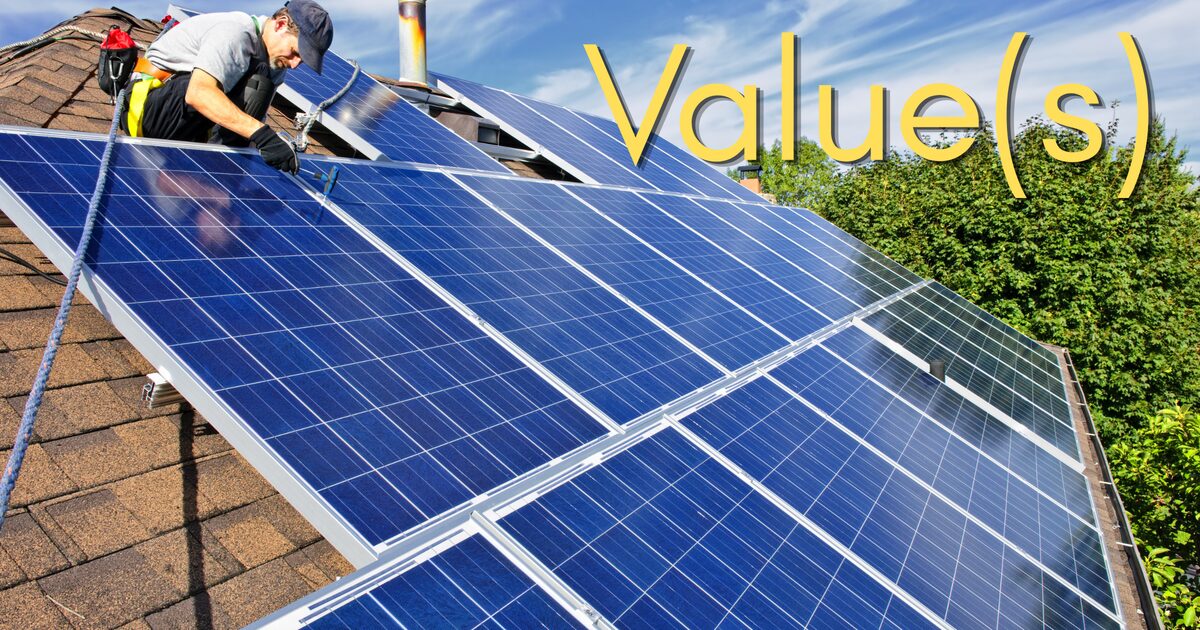 Value(s) — a worker installs solar panels on a house roof under a blue sky